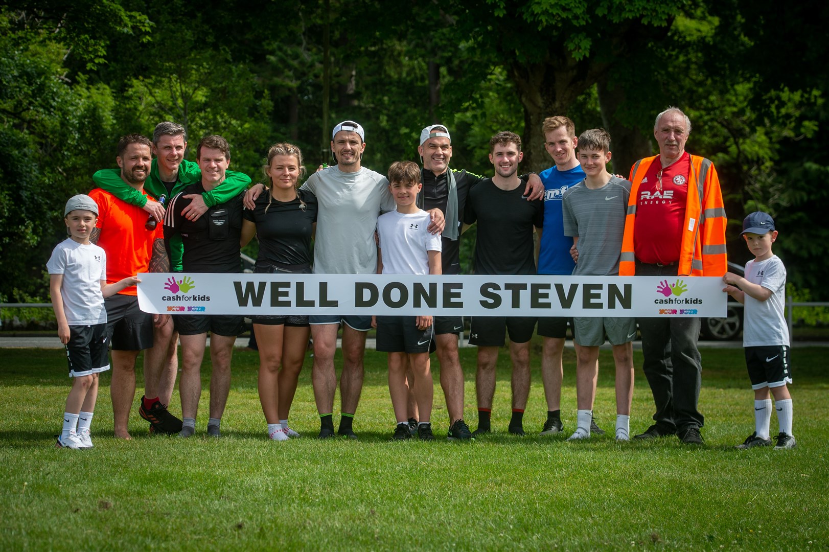 Steven Mackay with some of those who supported him in the quadruple marathon fundraiser last month. Picture: Callum Mackay