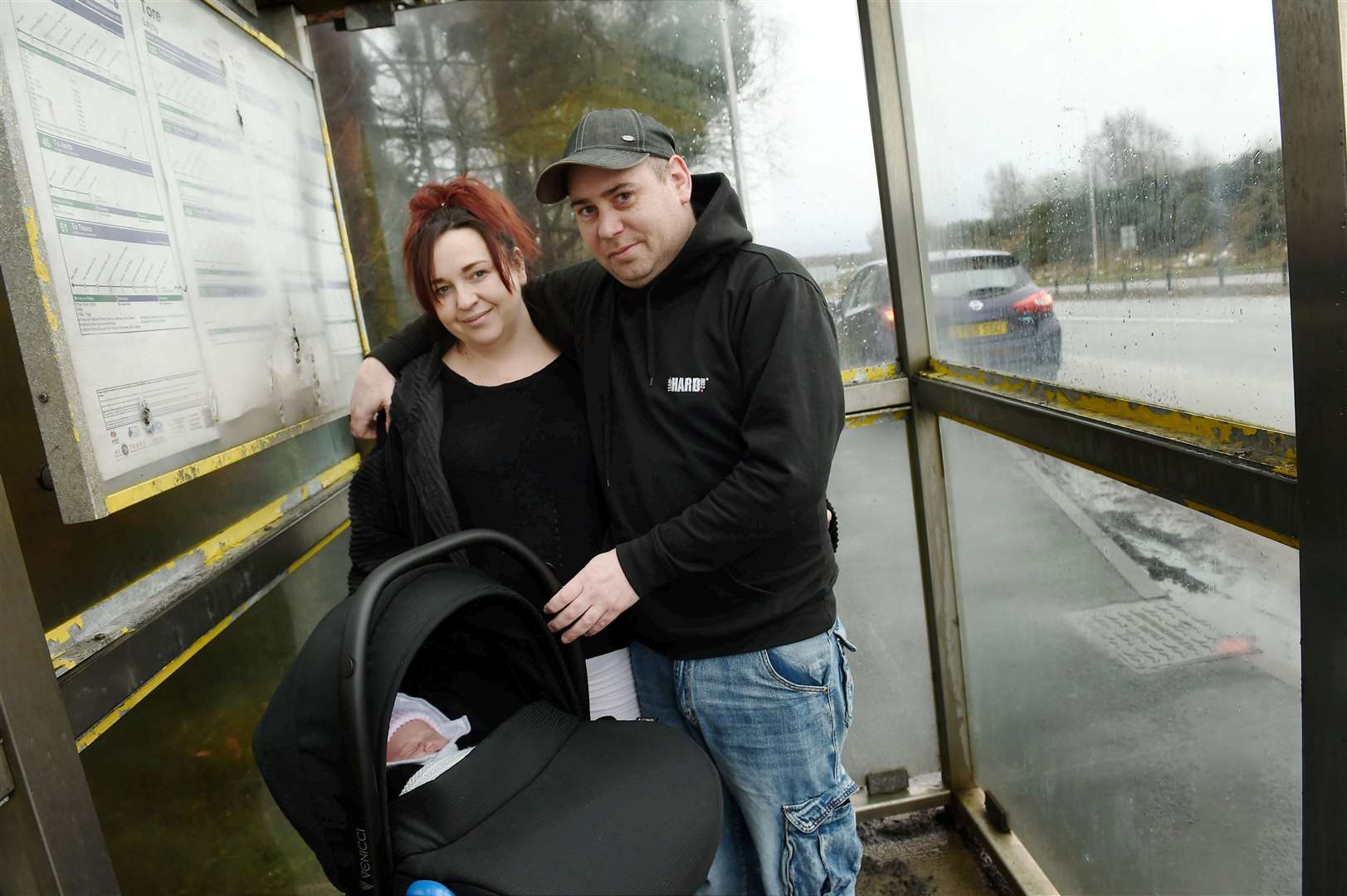 Amanda Jolly and Andy MacKay with their daughter Faith MacKay who was born at the southbound bus stop on the A9 near the Tore roundabout.