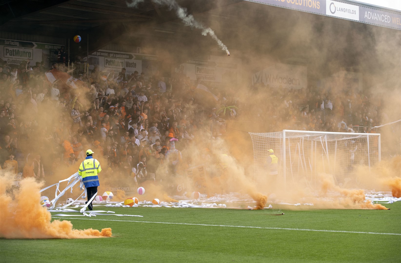 Dundee United fans' smoke-bombs hold up the game’s start for five minutes. Picture: Ken Macpherson