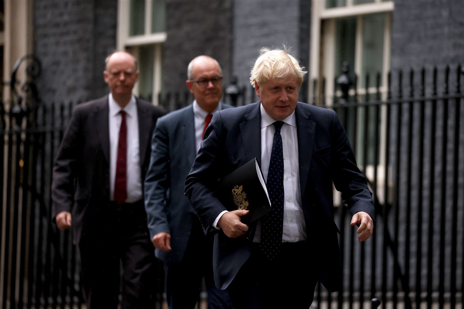 Sir Chris Whitty, Sir Patrick Vallance and then prime minister Boris Johnson leaving 10 Downing Street, London, ahead of a Covid-19 media briefing (Dan Kitwood/PA)