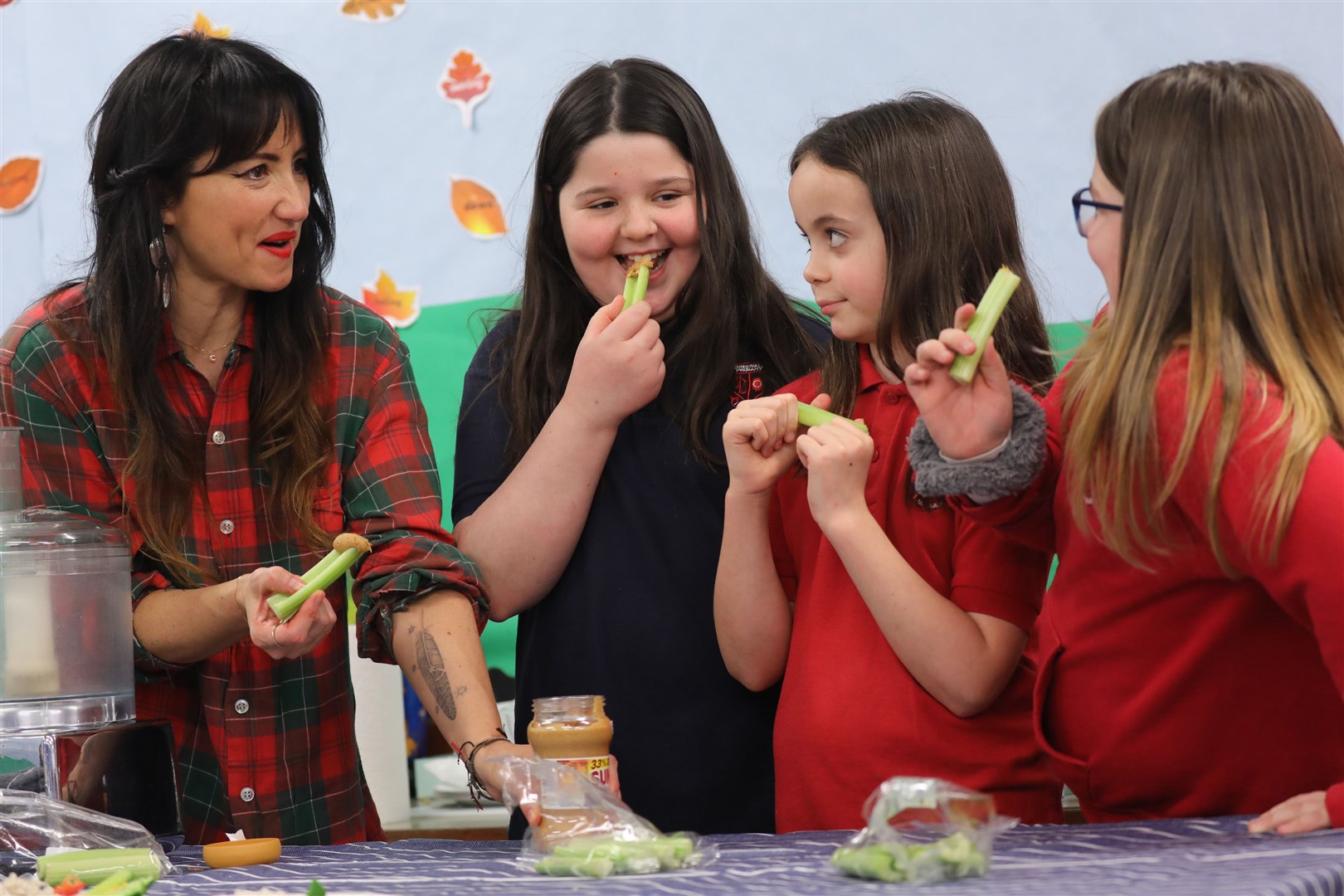 Pupils Darcie Smith, Charley Stewart and Amy Mackay help KT with the cookery class. Pictures: Stewart Attwood