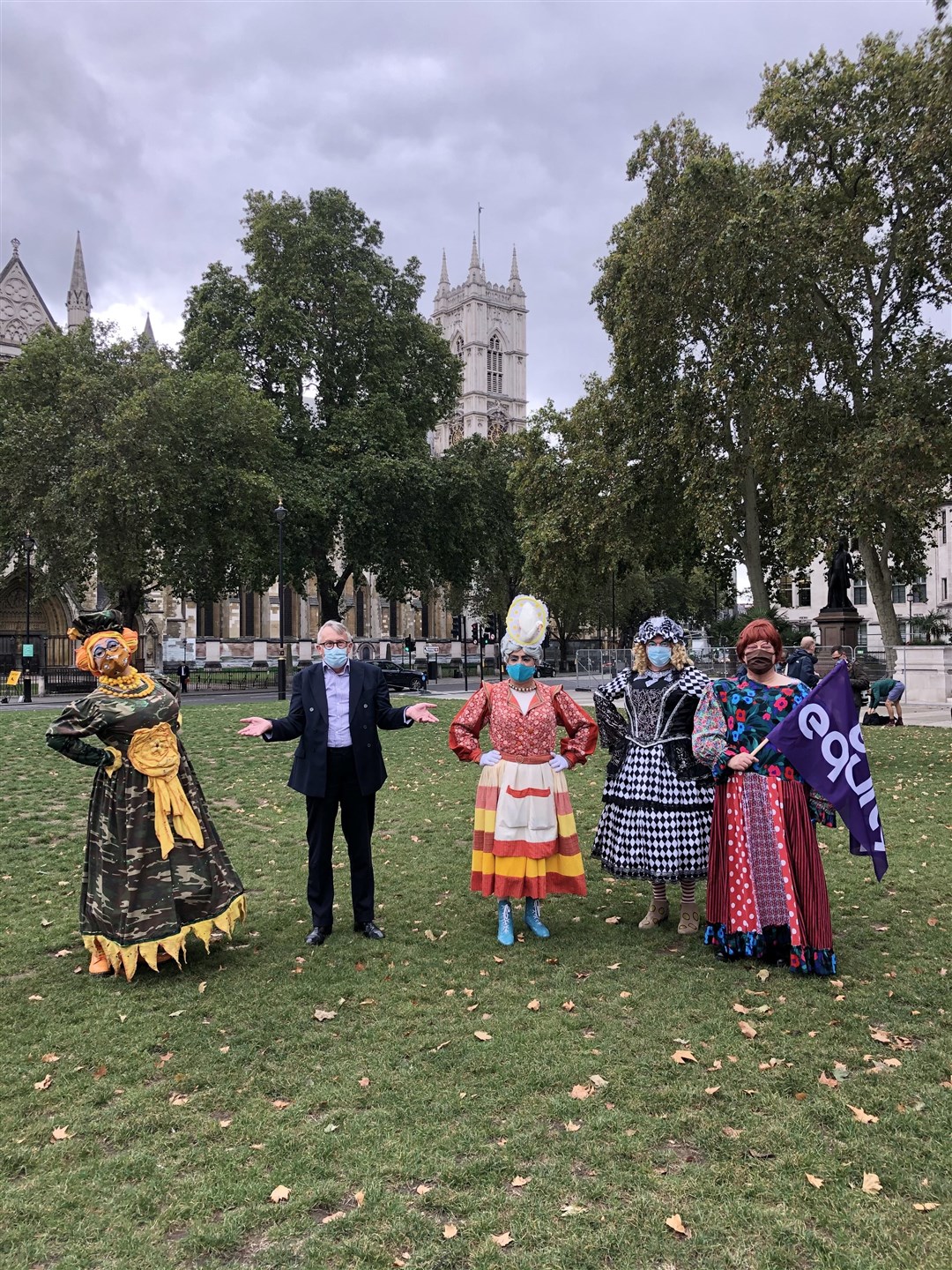 MP Jamie Stone with some fo the protesting panto dames in Parliament Square.