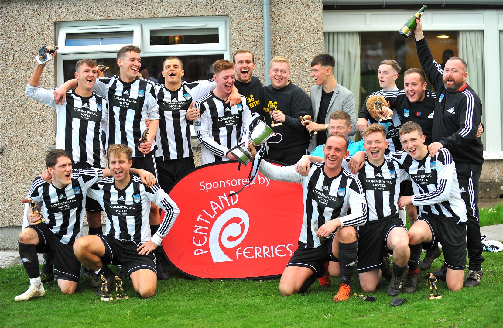 Alness United win the cup.