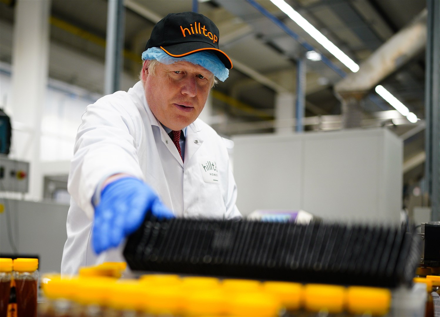 Prime Minister Boris Johnson visited Hilltop Honey in Powys, Wales, on Friday (Ben Birchall/PA)