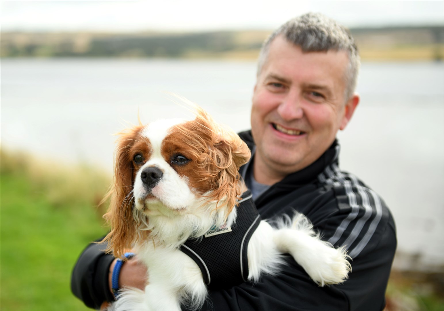 Gary Campbell from Dingwall with Harley, his Blenheim Cavalier King Charles Spaniel. Picture: James Mackenzie.