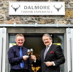 Dalmore Distillery manager Ian Mackay (left) and Whyte & Makcay master blenderand distiller Richard Paterson toast the opening