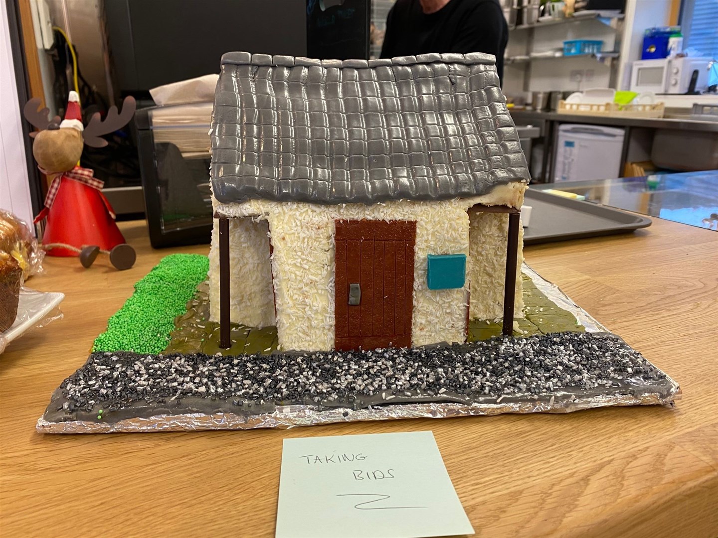 The Kinlochewe Public Toilets cake raised over £100.