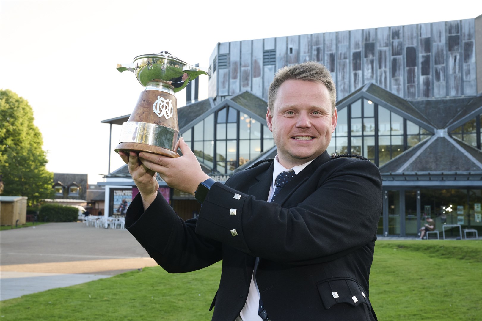 Callum Beaumont with the Northern Meeting Quaich for aggregate performance in former winners competitions in front of Eden Court.