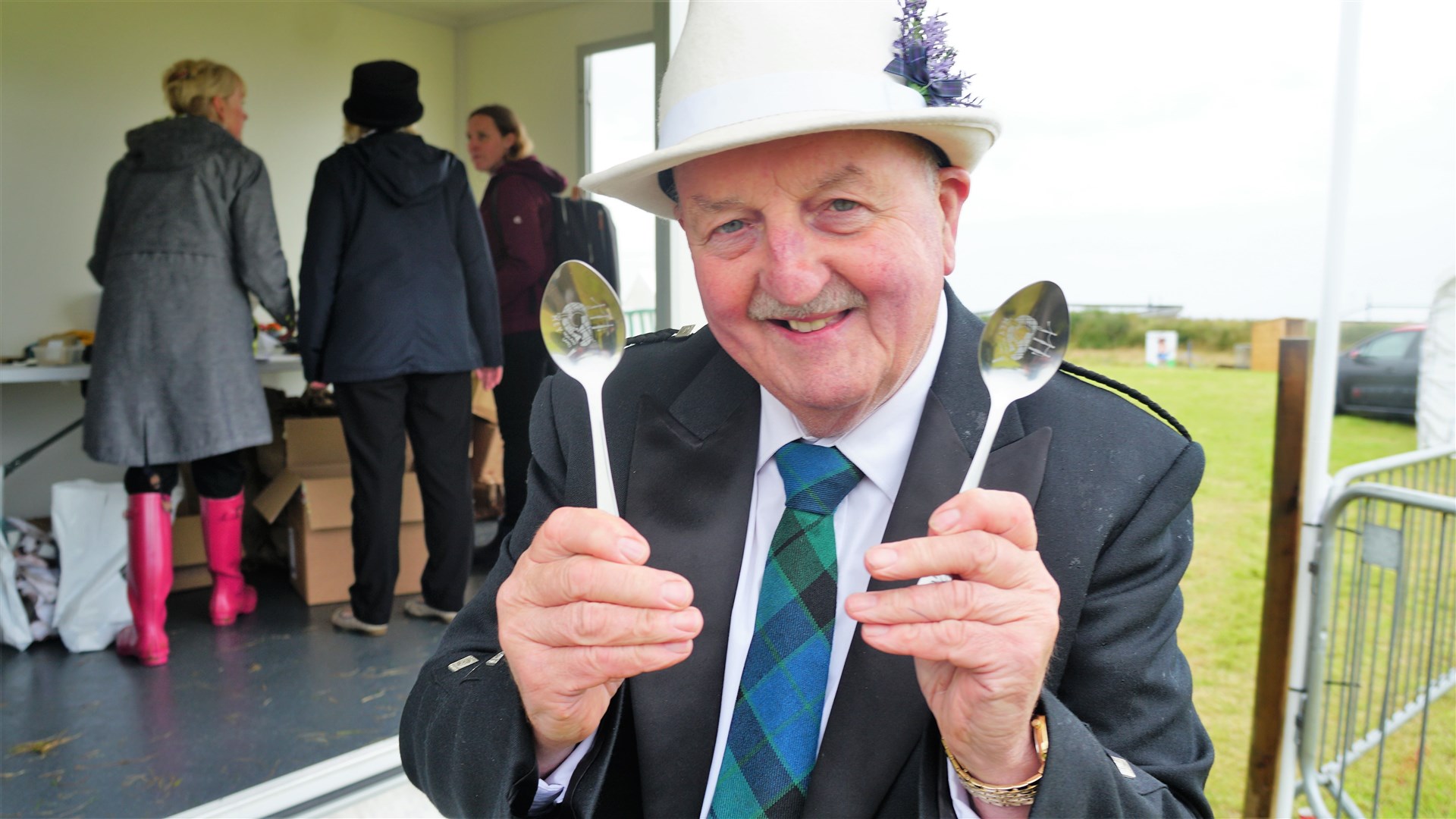 Compere at the event Willie Mackay was delighted to receive an engraved set of silver spoons. Willie is well known for his spoon playing skills and played a tune minutes after receiving his gift. Picture: DGS