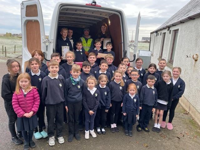 Inver Primary pupils sending off their Christmas Boxes.