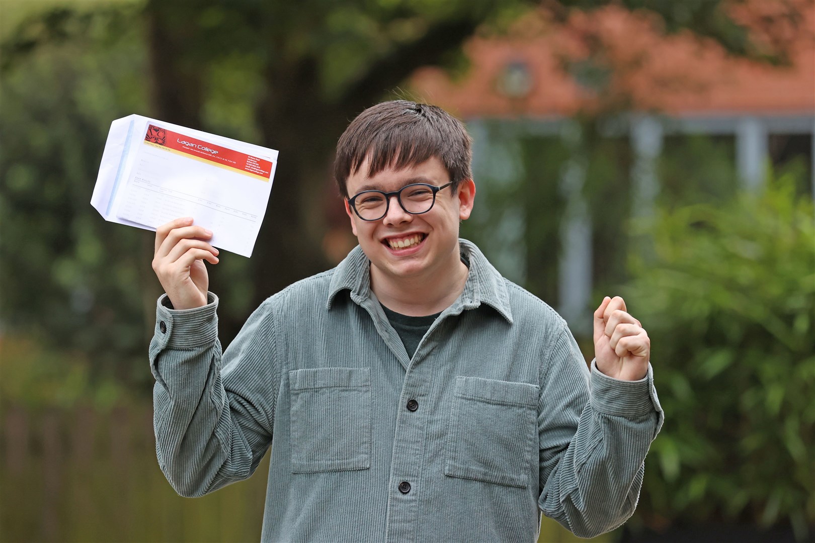 STUDENT DETAILS PIXELATED BY PA PICTURE DESK Cohen Taylor receives his A-level results at Lagan College, Belfast (Liam McBurney/PA)