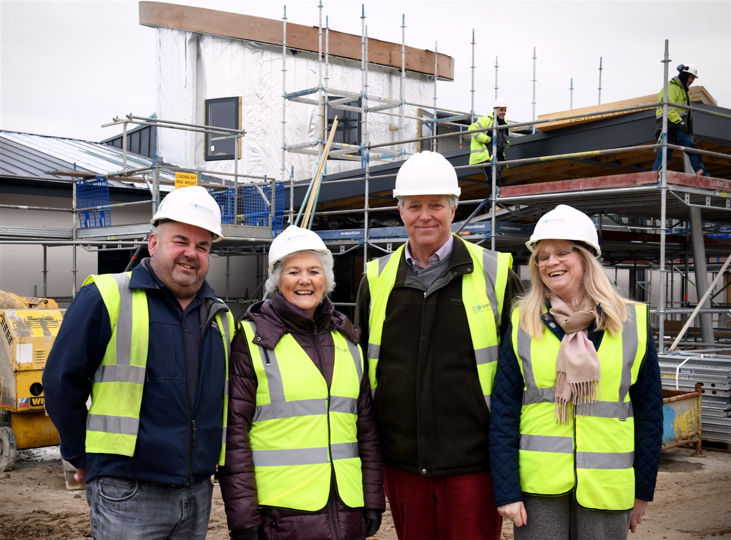 Site manager Greg Cooper, Elsie Normington, Edward Mountain and Rona Matheson take a tour of the Haven Centre site.