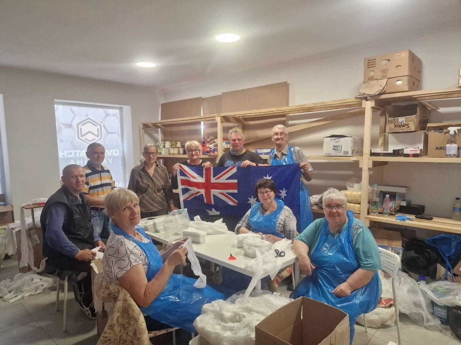 Some of the Ukrainian volunteers who asked Daniel Hall to show their photos to people back home. The group raised the Australian flag in solidarity with their guest from Inverness who was born and brought up Down Under.
