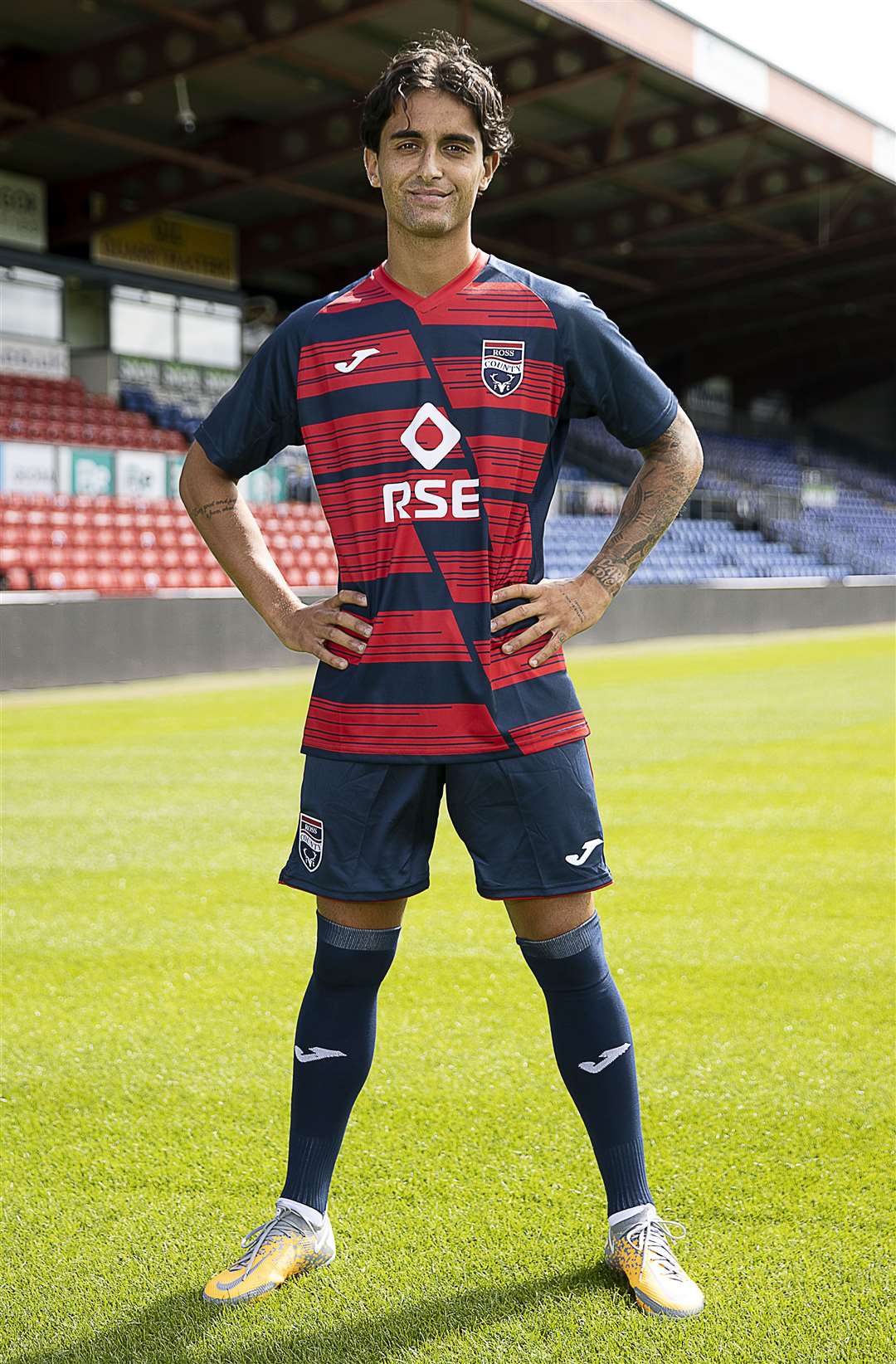 Picture - Ken Macpherson. See story. Ross County's Yan Dhanda yesterday (Thurs) modelled the new Ross County home kit for Season 2022-23.
