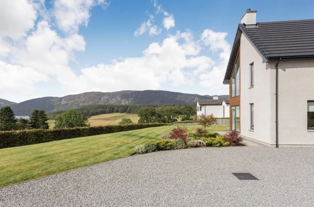 A stunning view of the Highlands surrounds the property