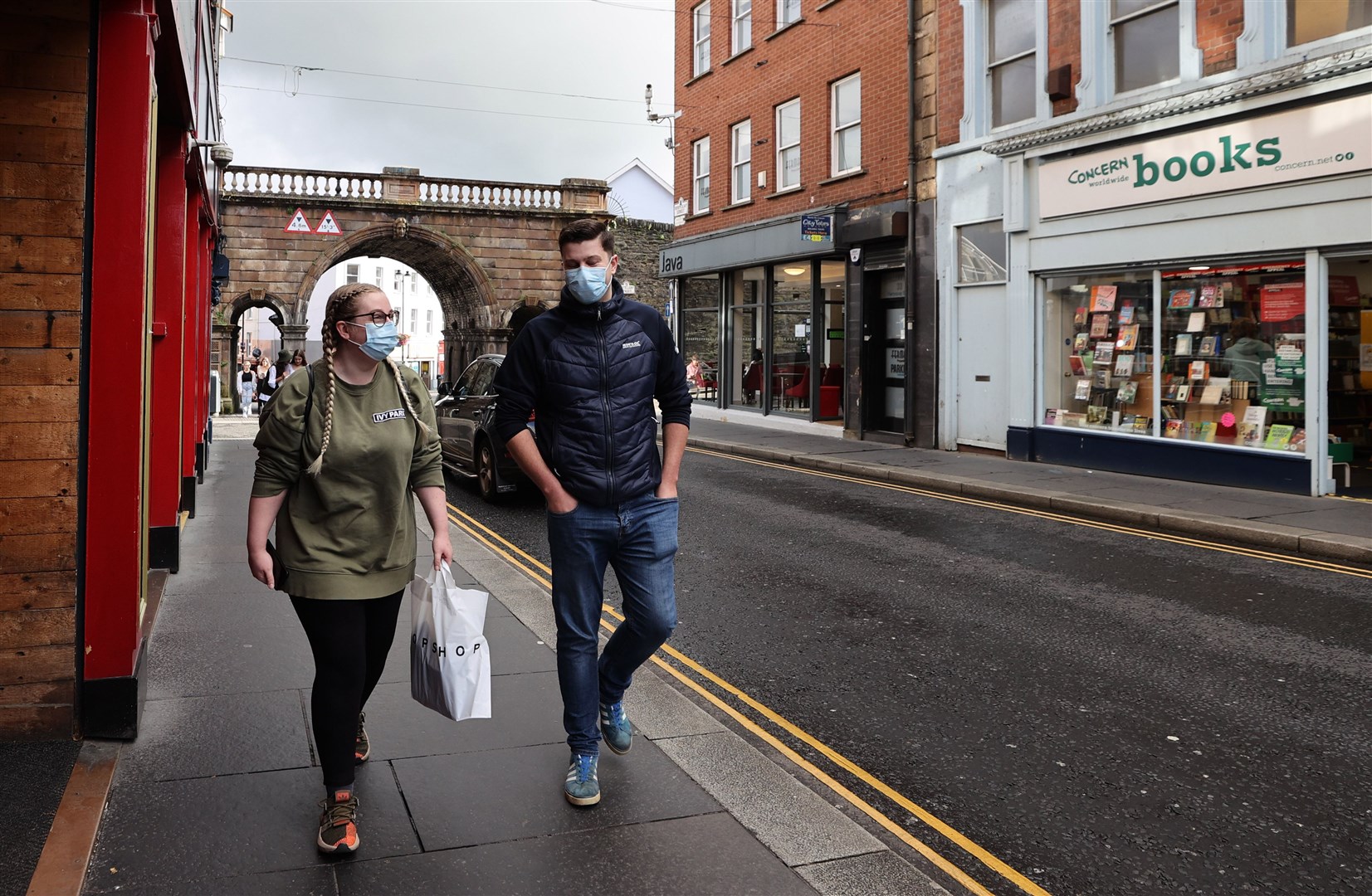 People walking along Ferryquay Street in Londonderry (Liam McBurney/PA)