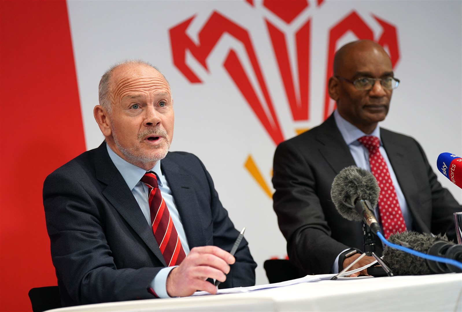 WRU chairman Ieuan Evans, left, and acting chief executive Nigel Walker, were called before the Senedd committee for its first hearing into the allegations (Jacob King/PA)