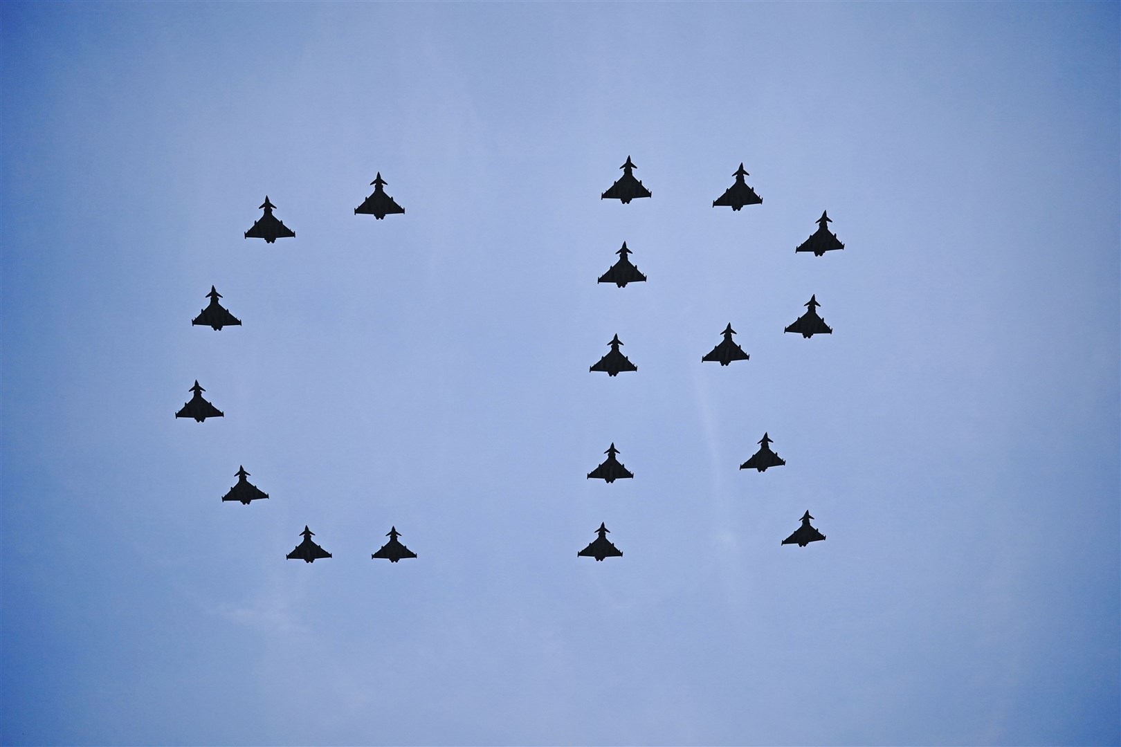 Typhoon fighter jets fly over The Mall in a CR formation (Aaron Chown/PA)
