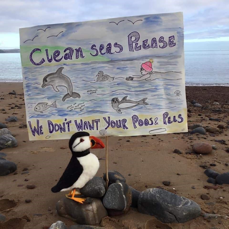 Dawn protest by sea and shore users against pollution