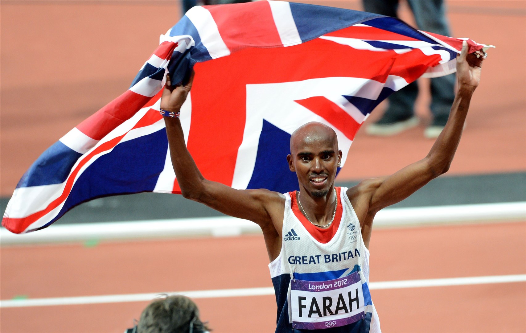 Great Britain’s Mo Farah celebrates winning the Men’s 10,000m final at the Olympic Stadium, London (John Giles/PA)