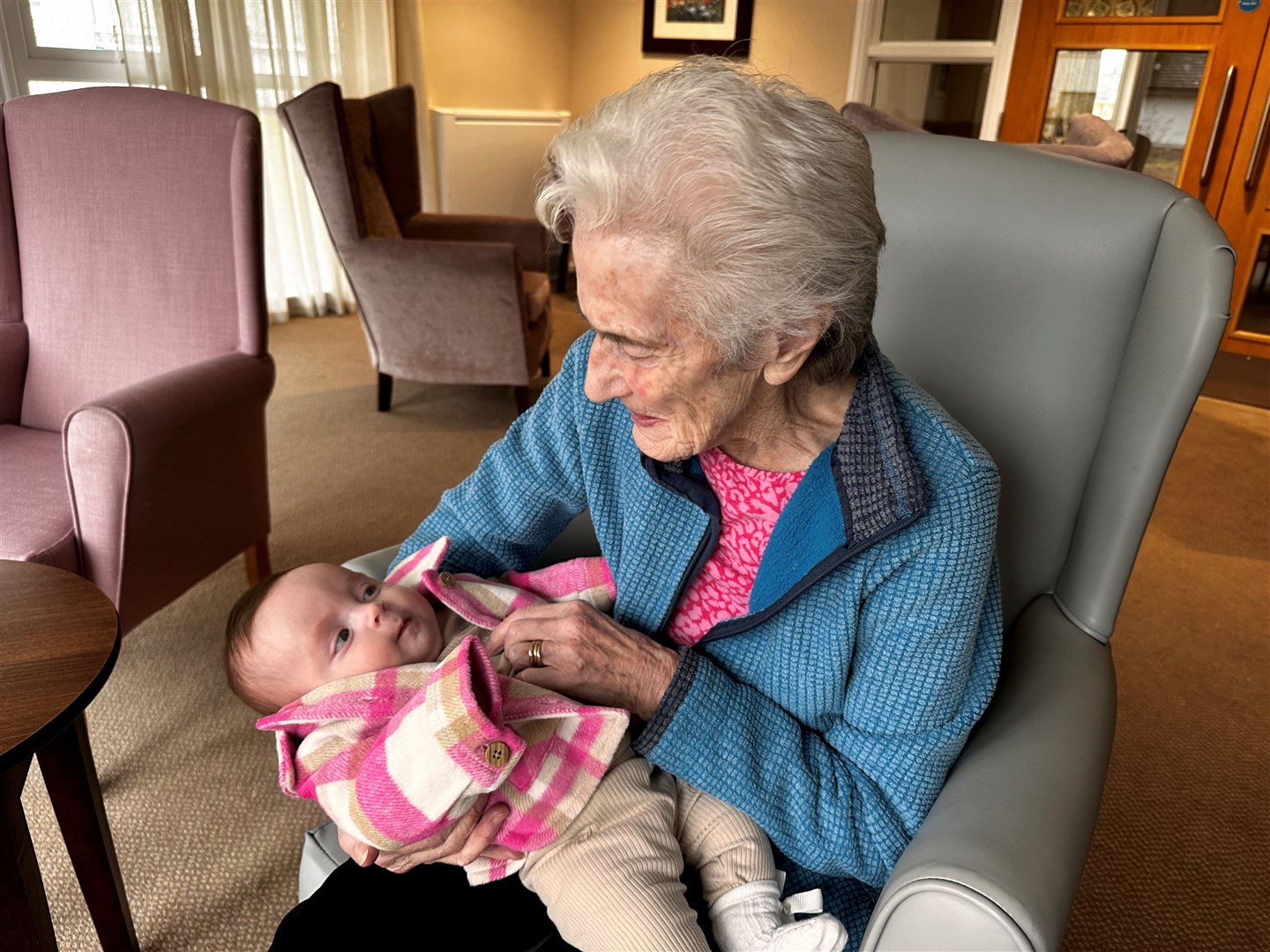 Resident Ina MacFadyen and Joe Greiner's daugther Ezra. Picture: Parklands Care Homes.