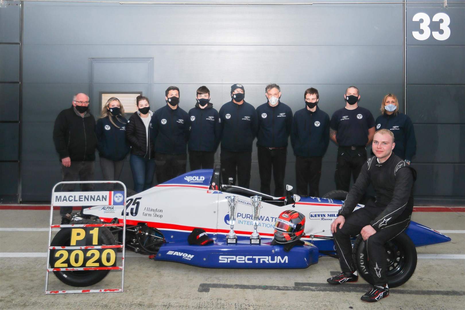 Neil Maclennan with his team at Kevin Mills Racing.