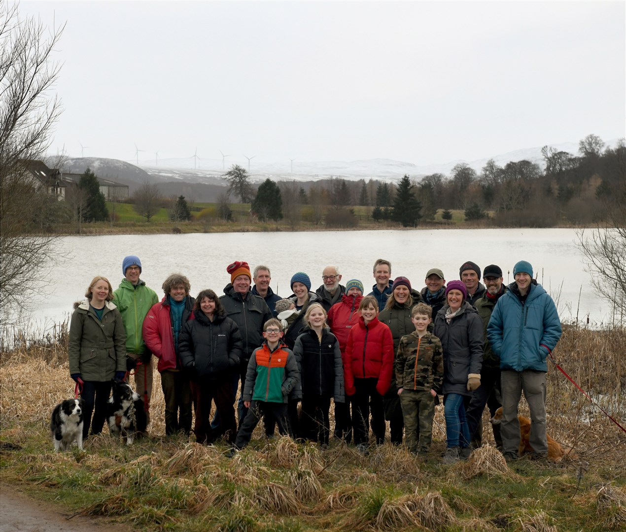 Strathpeffer and Contin Better Cable Route supporters in front of Loch Kinellan flagging an area they fear could be adversely affected by pylons. They want constructive dialogue with all options on the table. Picture: James Mackenzie.