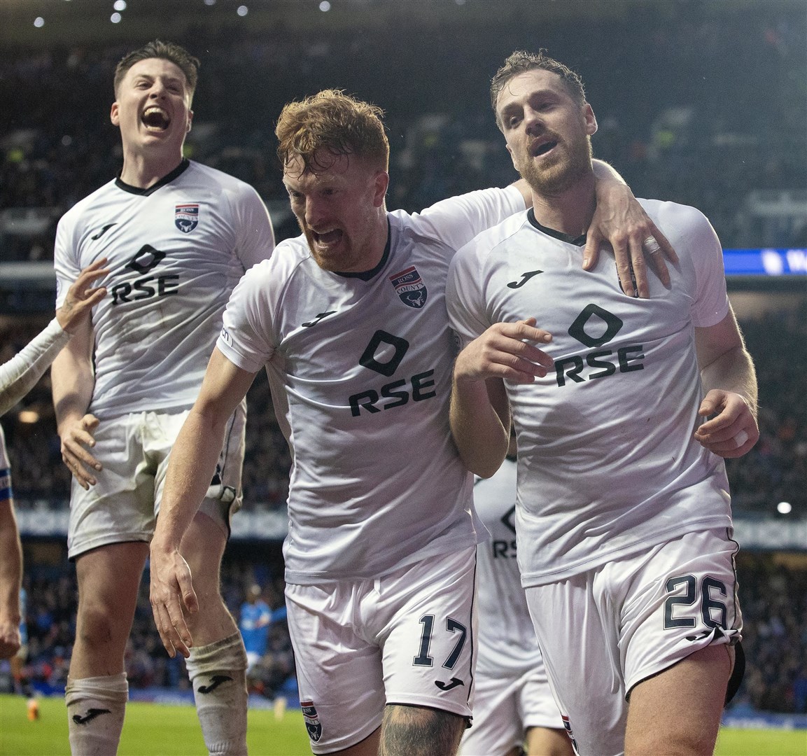 Ross County's Jordan White celebrates scoring in a defeat at Ibrox in February 2023.