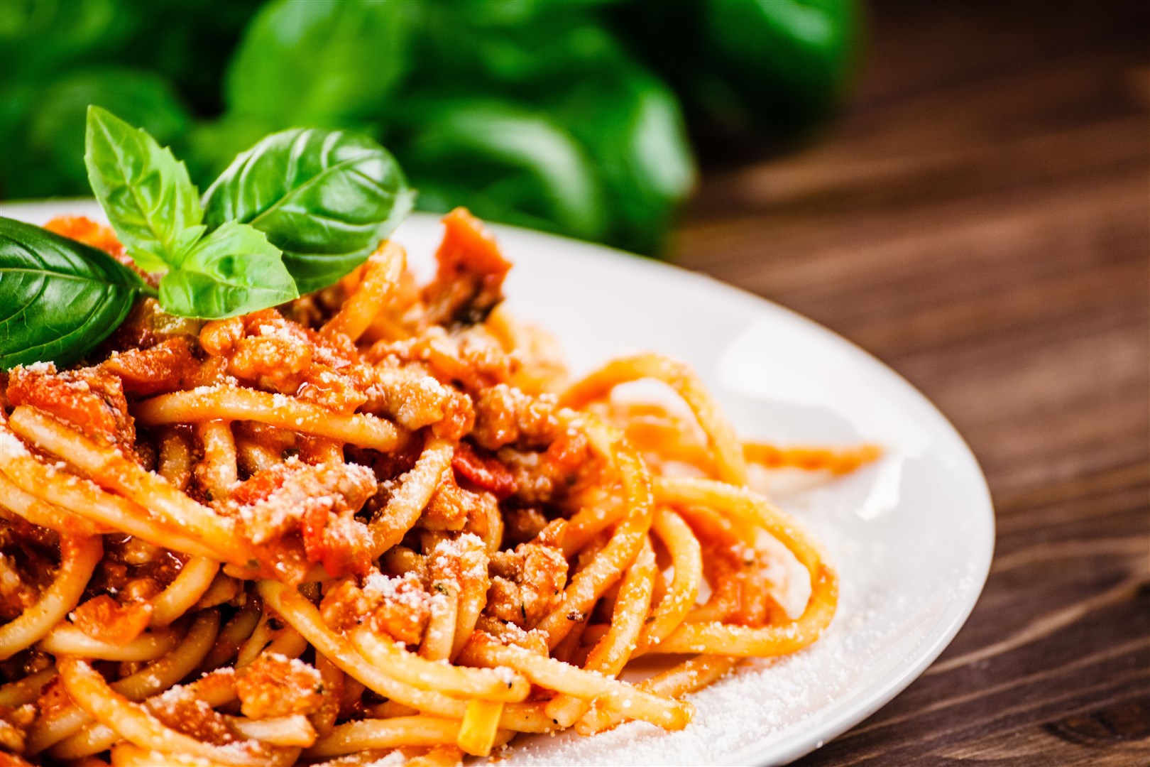 Pasta with meat, tomato sauce and vegetables.