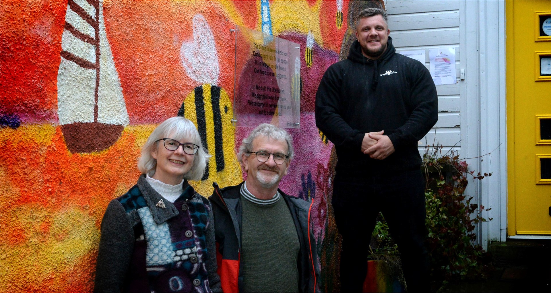 Jayne and Billy McMaster from the Isobel Rhind Centre with strongman Luke Stoltman outside The Hive. Stoltman is an ambassador for Mikeysline. Picture: James Mackenzie