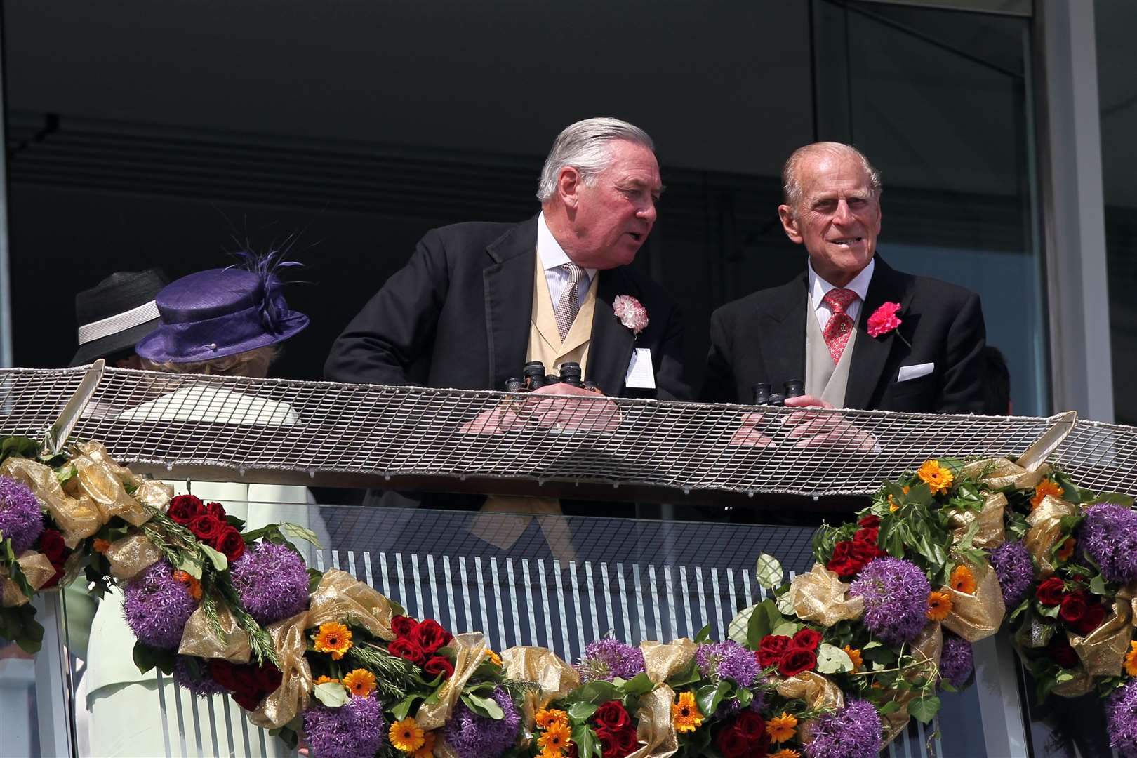 Lord Samuel Vestey and the Duke of Edinburgh on the balcony for the Investec Derby at Epsom Downs Racecourse (PA)
