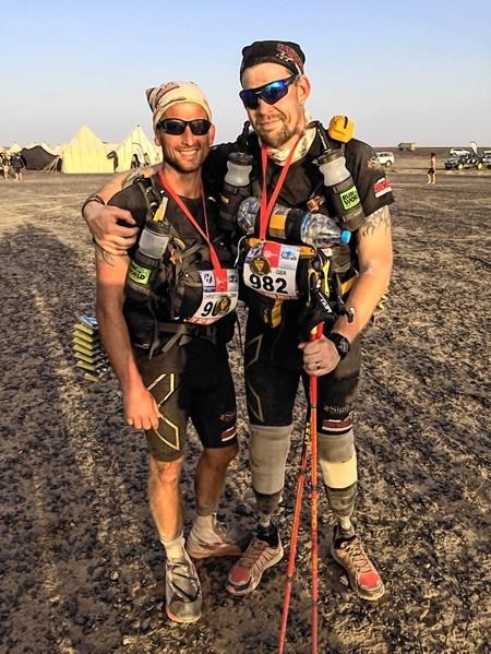 Duncan Slater (right) with former colleague Chris Moore after completing the Marathon des Sables.