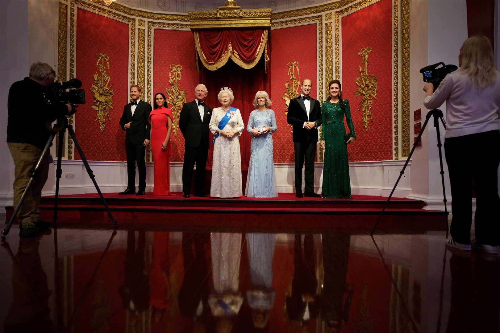 Wax figures of Queen Elizabeth II and members of the royal family at Madame Tussauds London ahead the Platinum Jubilee celebrations. (PA)