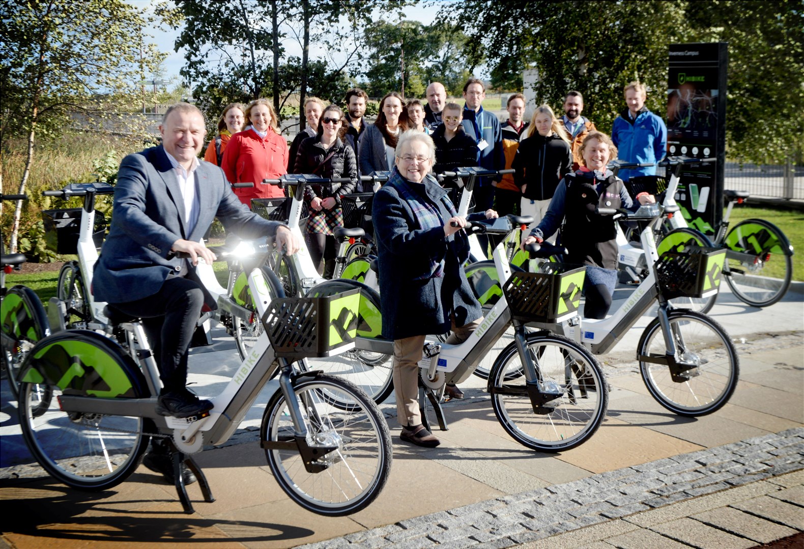 HI-BIKE launches at the University of the Highlands and Islands Campus: Drew Hendry, MP, Cllr Trish Robertson and Vikki Trelfer, Hi-Trans Active Travel Officer with supporters behind. Picture: James Mackenzie.