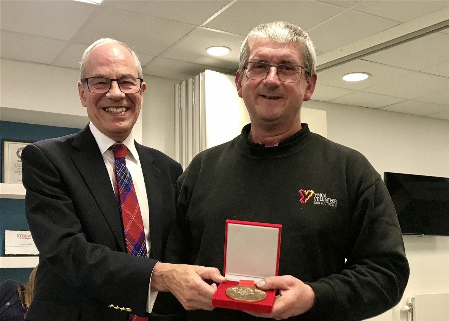 Peter Berry with John Naylor the outgoing President of YMCA Scotland who presented Peter with his award.