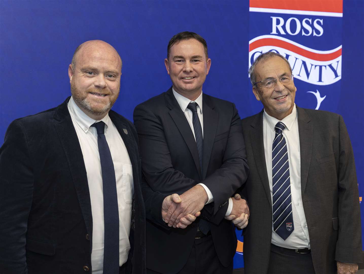 Derek Adams (centre) was appointed as the new manager of Ross County pictured with chief executive Steven Ferguson (left) and chairman Roy MacGregor (right). Picture: Ken Macpherson