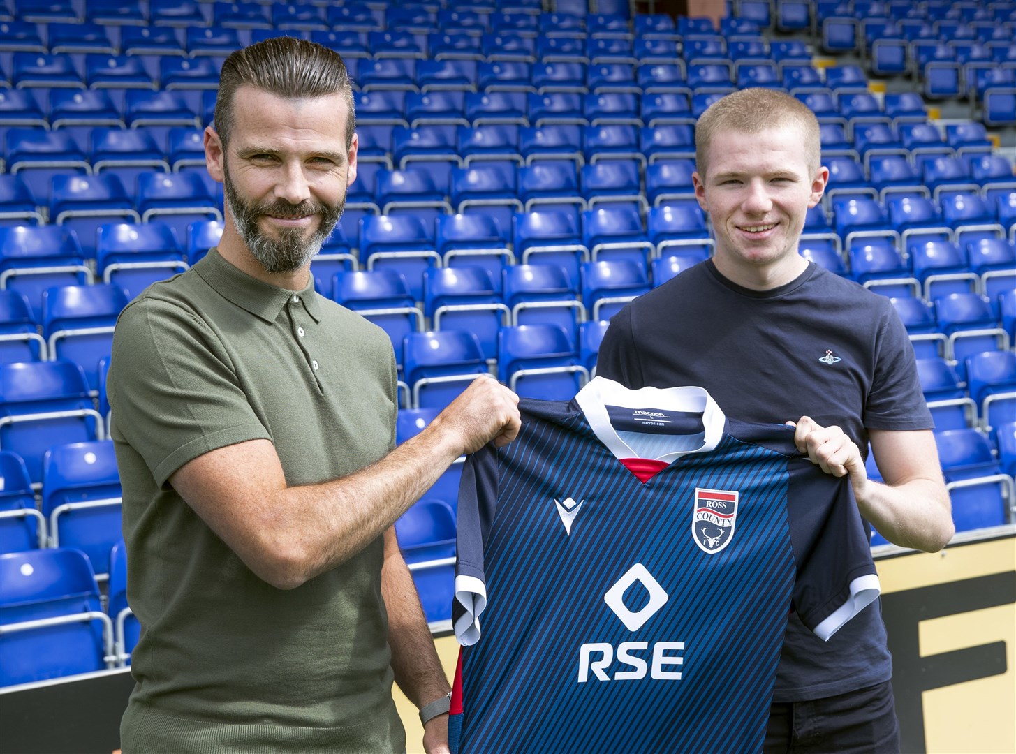 Ross County co-manager Stuart Kettlewell welcomes new signing Stephen Kelly. Picture: Ken Macpherson.