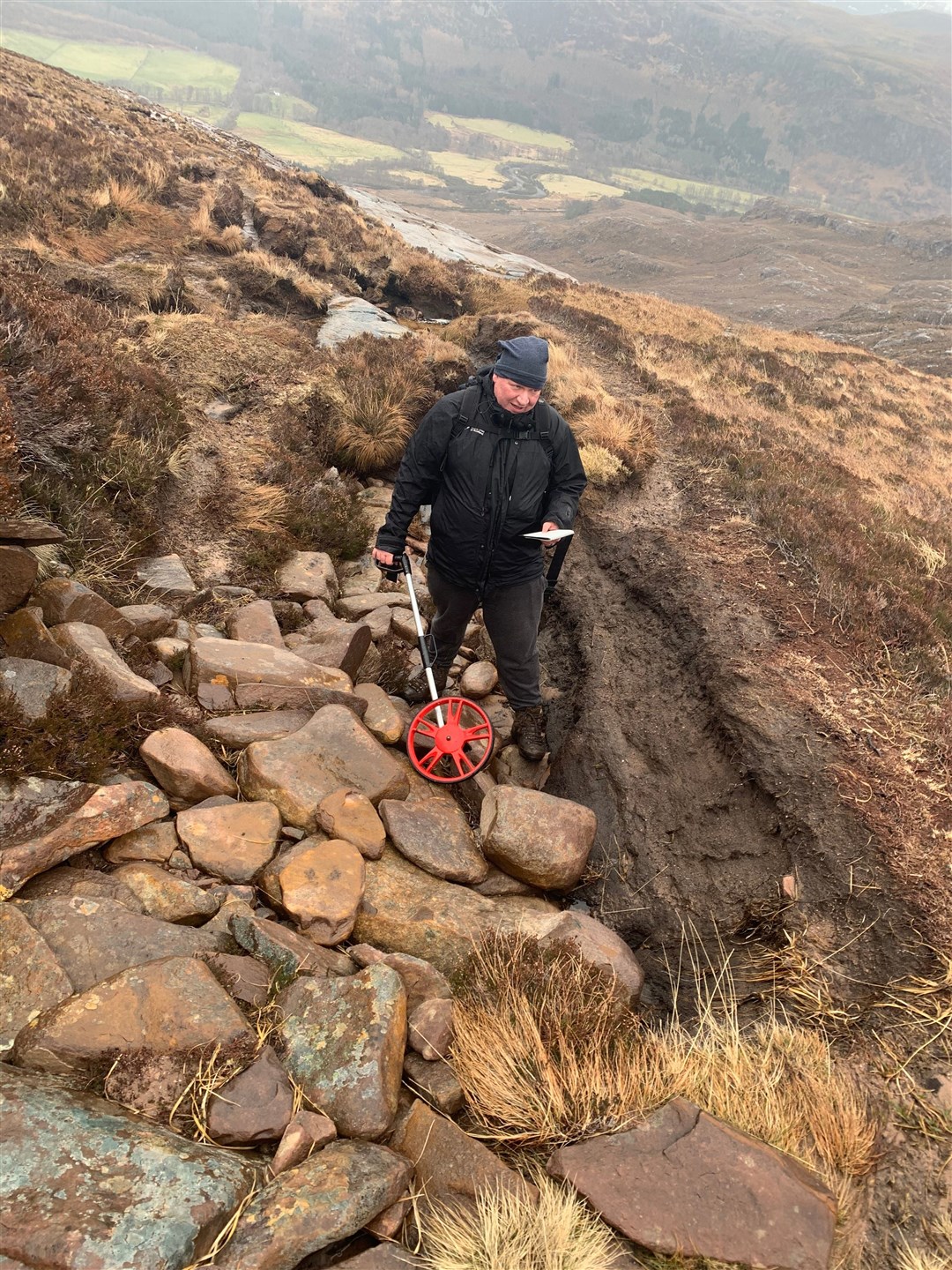 Dougie Baird of OATS carrying out a path survey on An Teallach. Picture: OATS