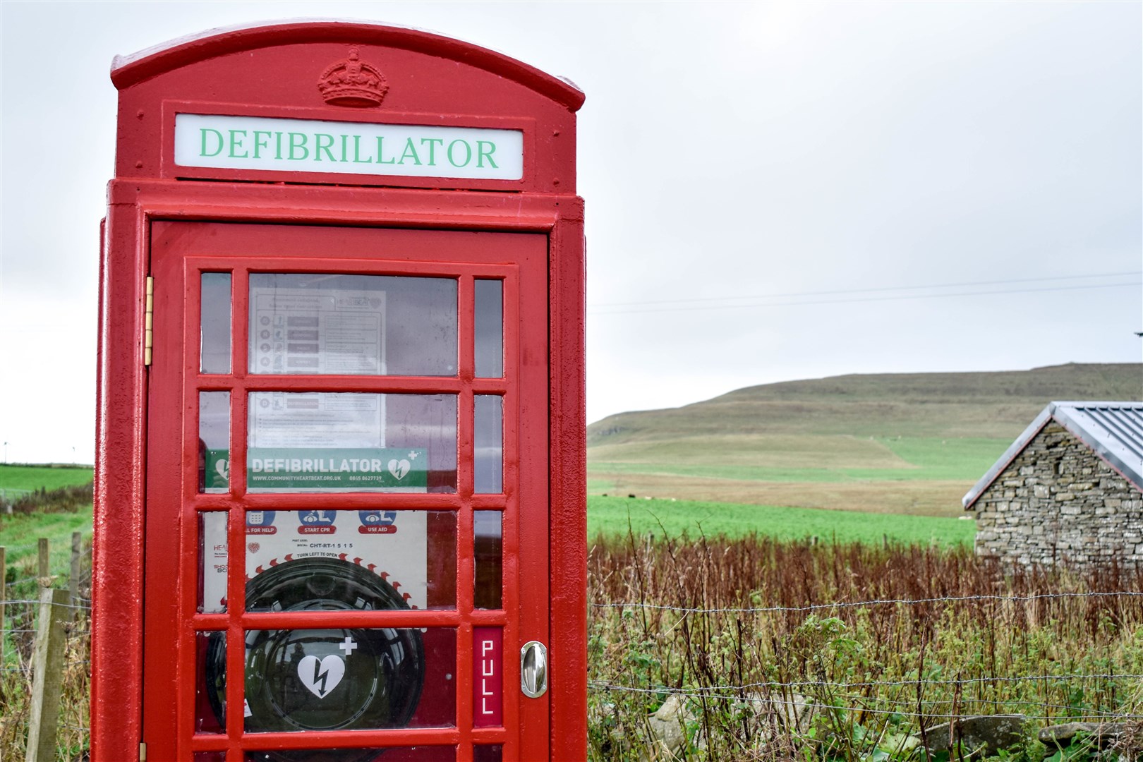 A red phone box after its conversion to a defibrillator station. Picture: Isobel Thompson, Operations Manager of the Westray Development Trust.