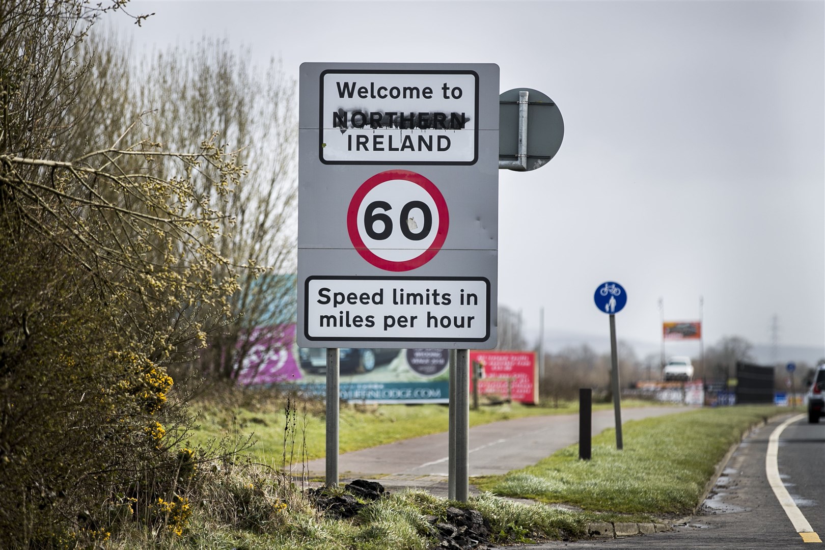 A UK road sign close to the border between the Republic of Ireland and Northern Ireland on the Buncrana Road outside Londonderry (Liam McBurney/PA)