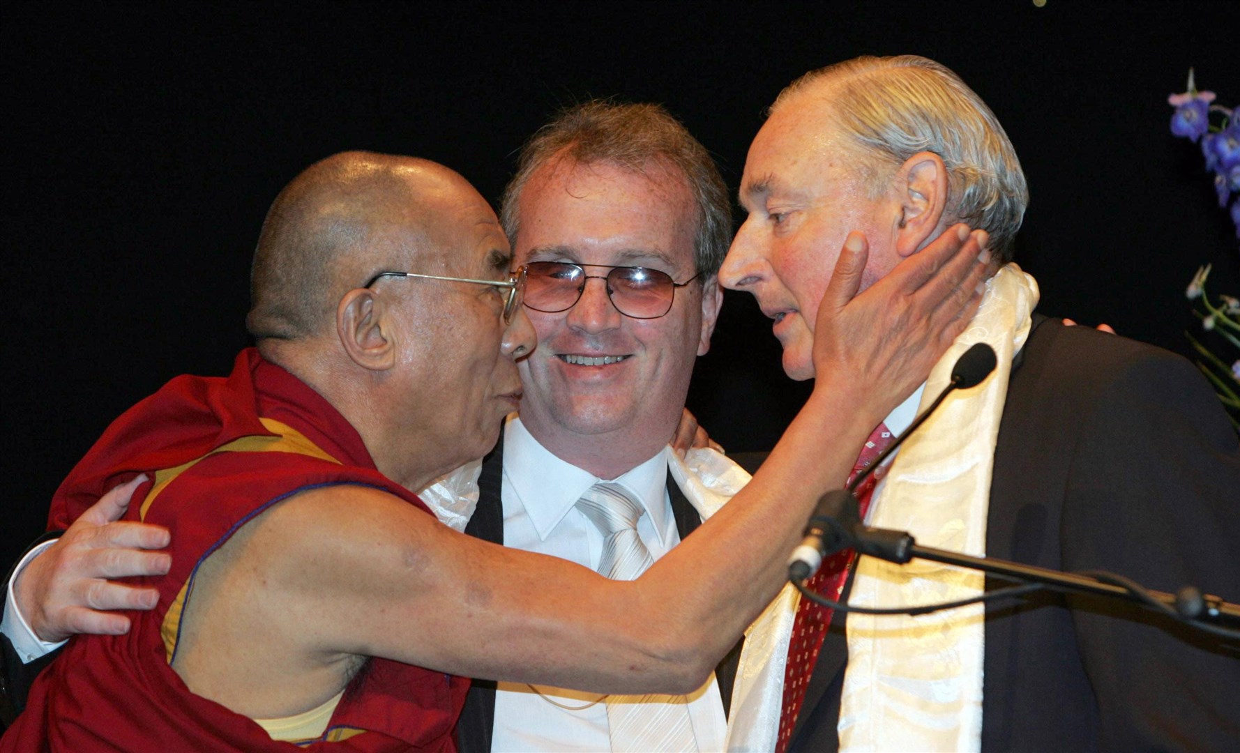 The Dalai Lama with Richard Moore (centre) and Charles Inness (right) (Lorcan Doherty/PA)