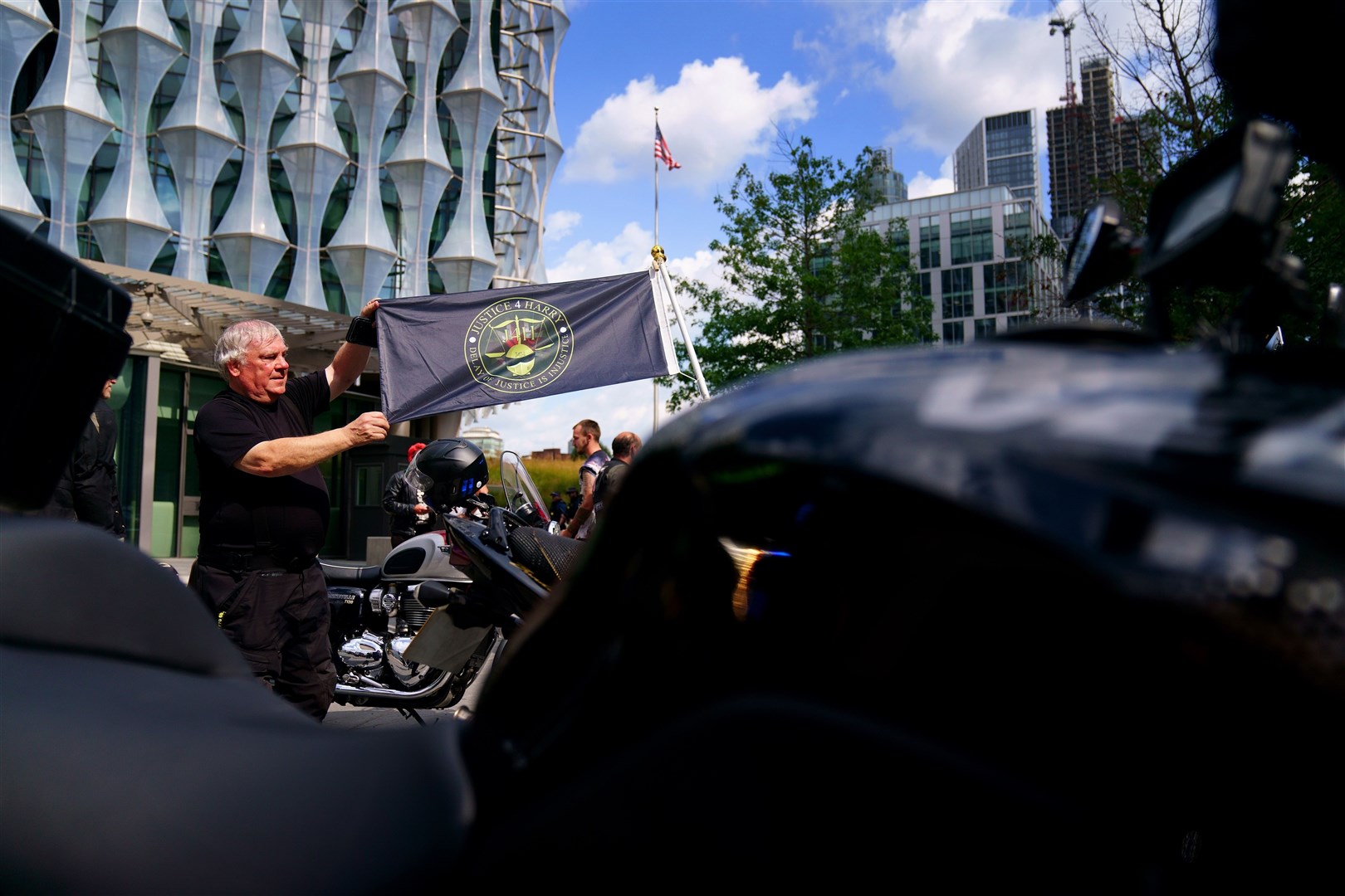 Motorcyclists marked Mr Dunn’s death with a ‘rev-off’ outside the embassy (Victoria Jones/PA)
