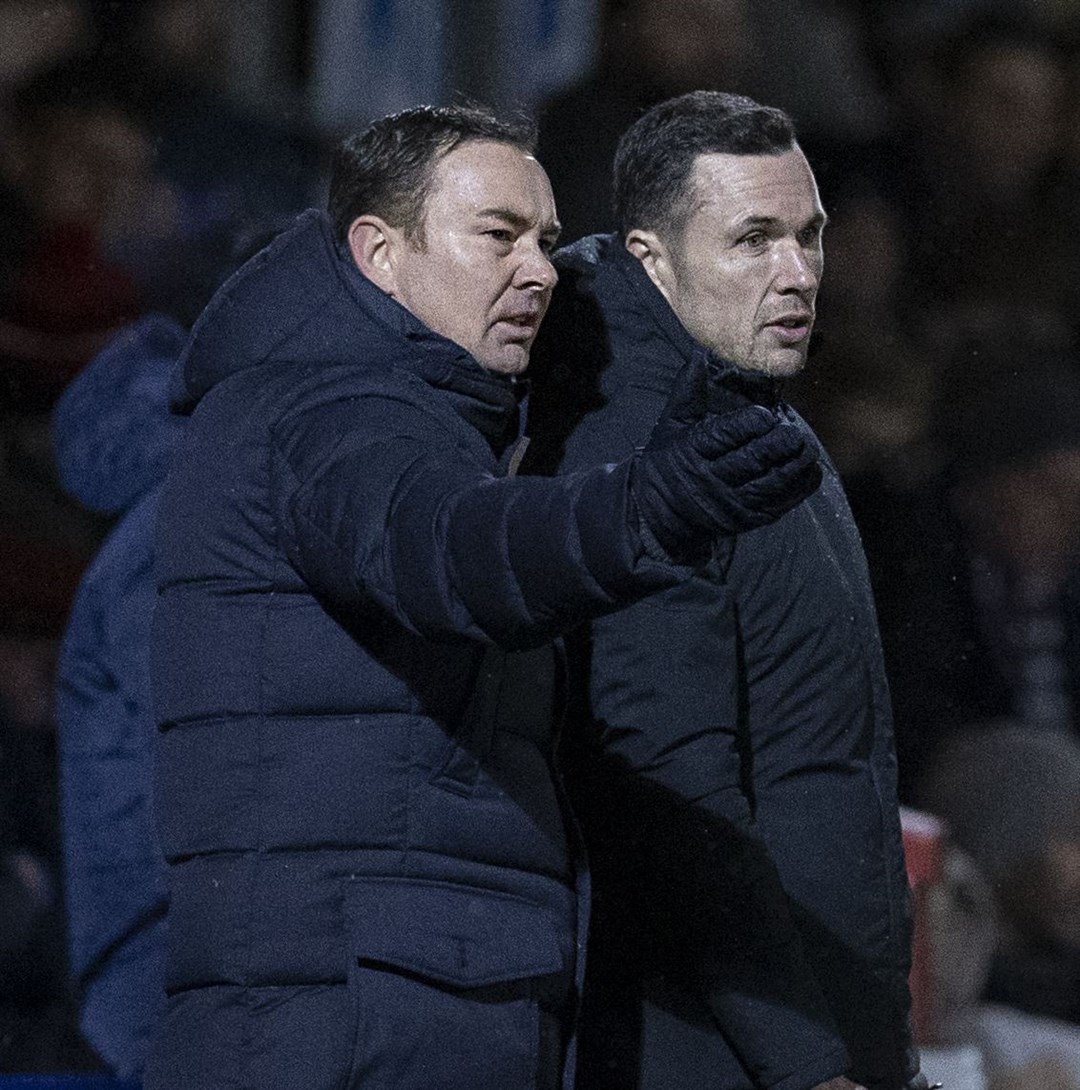 Ross County manager Derek Adams and assistant manager Don Cowie discuss onfield events.