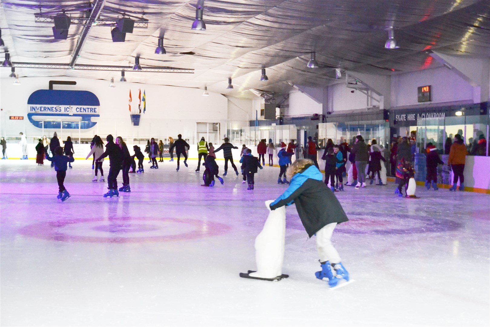 The ice rink was packed with young carers for the ice disco. Copyright Paul Donald