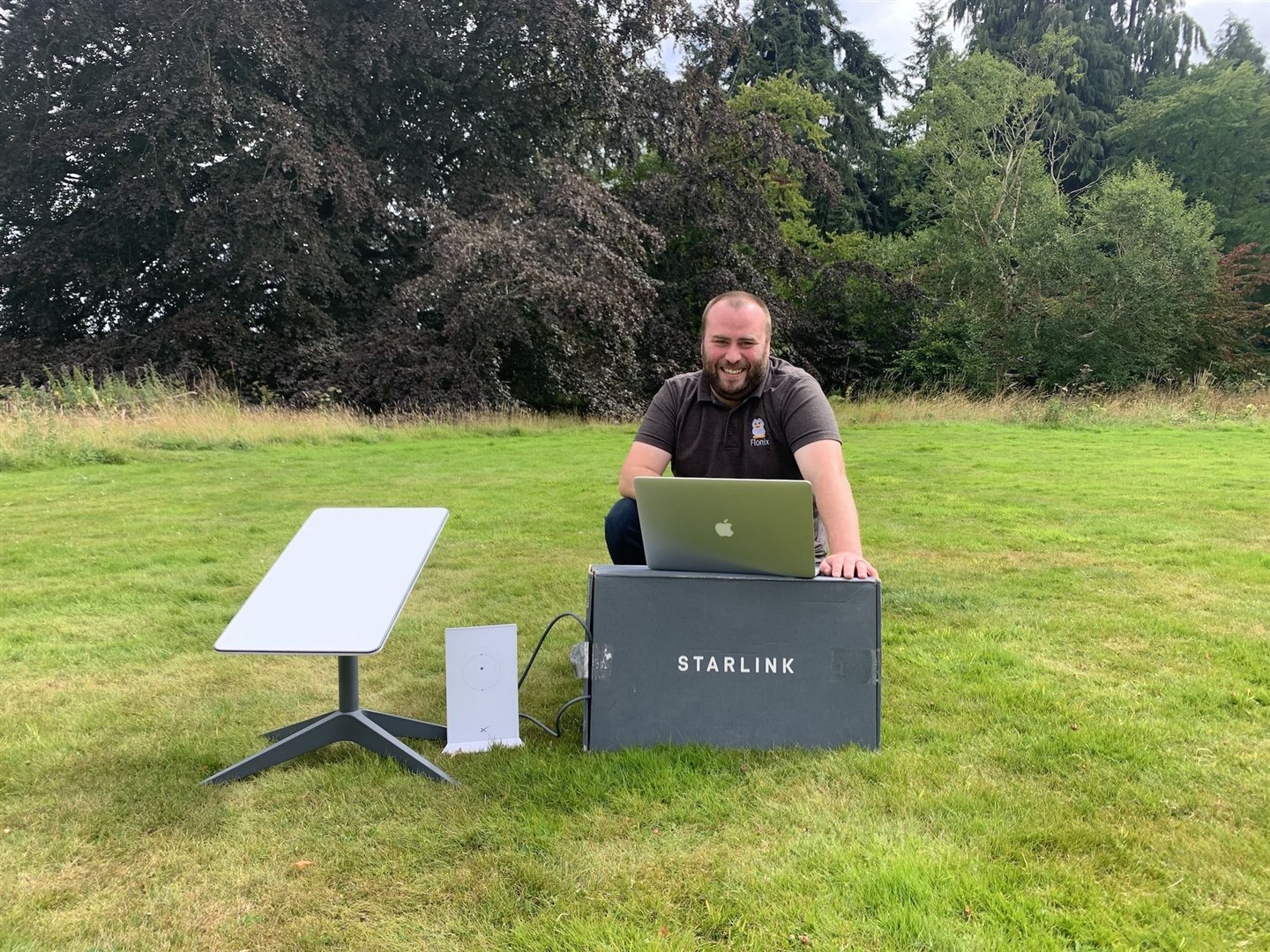 Flonix MD Daniel Lamb with one of the Starlink installation systems.