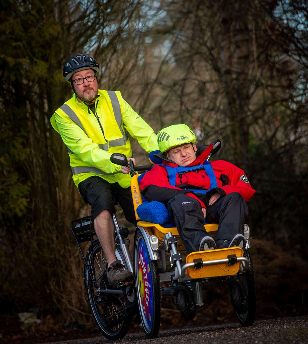 Mark Forbes raised money to buy a special e-bike for his disabled brother-in-law James Murray. Picture: Callum Mackay.