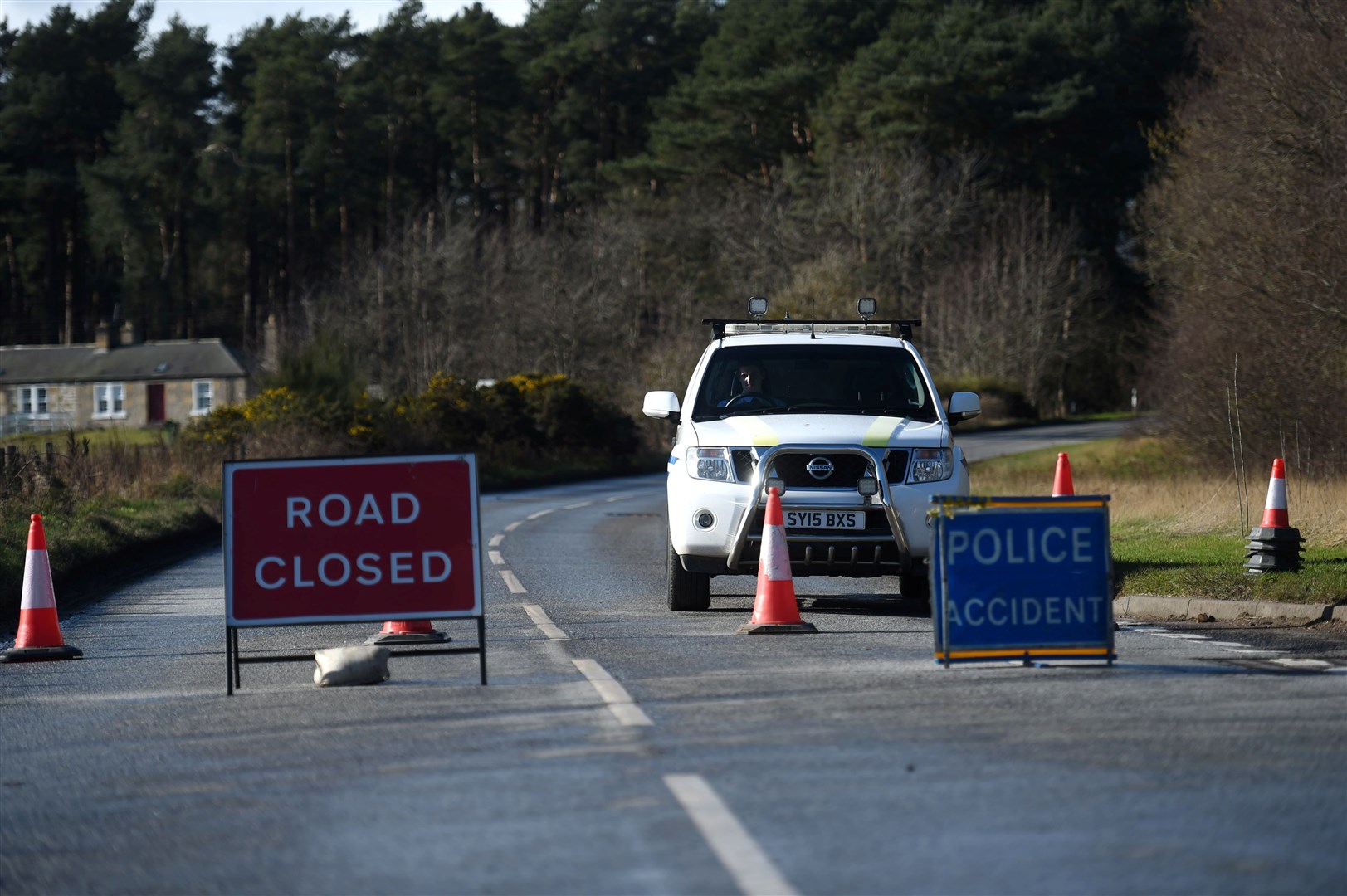 A four-car crash on the B9039 near Inverness Airport has resulted in the closure of the road.