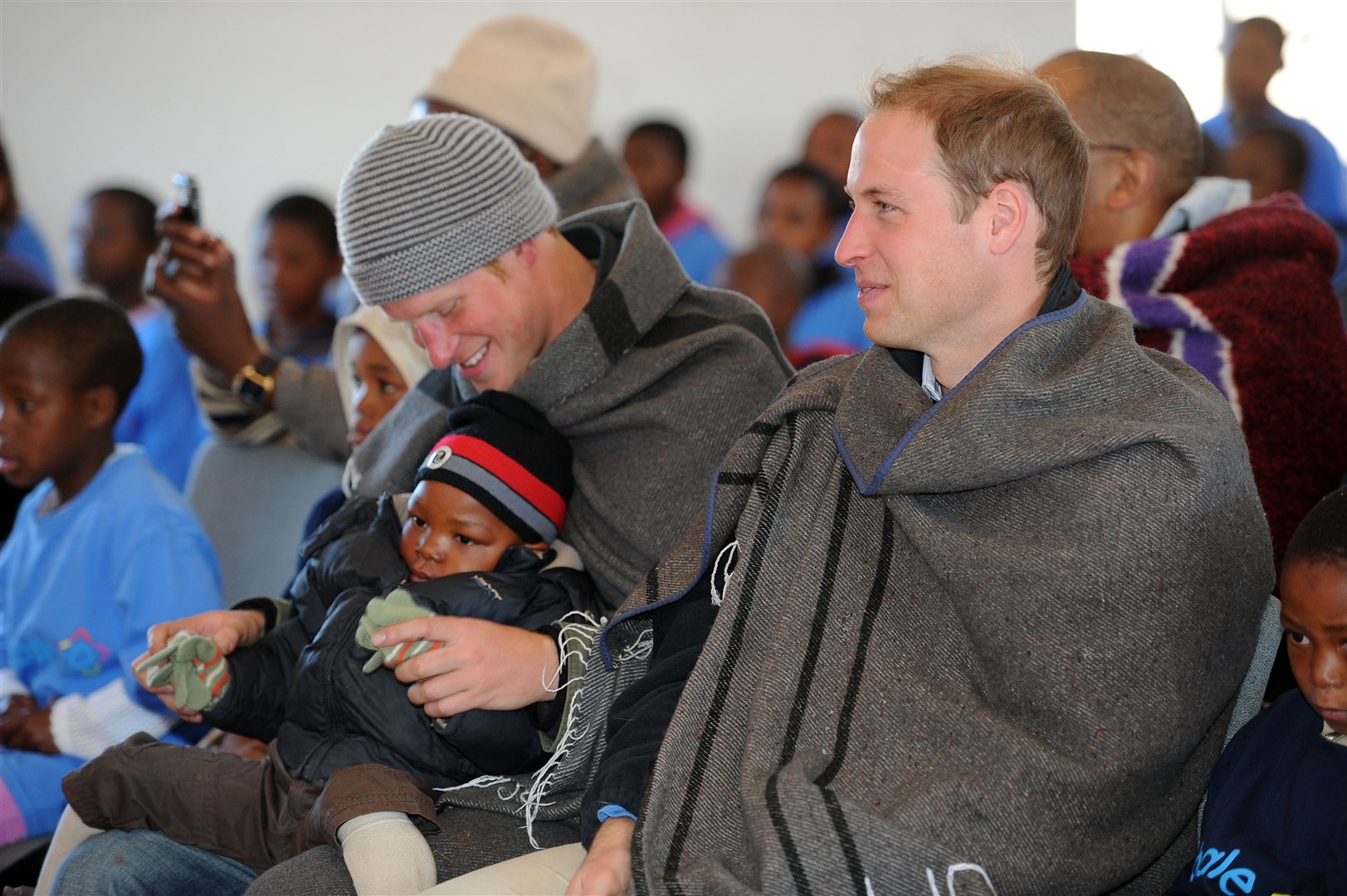 Harry and William at a children’s orphanage on a joint tour to Lesotho in 2010 (Anthony Devlin/PA)