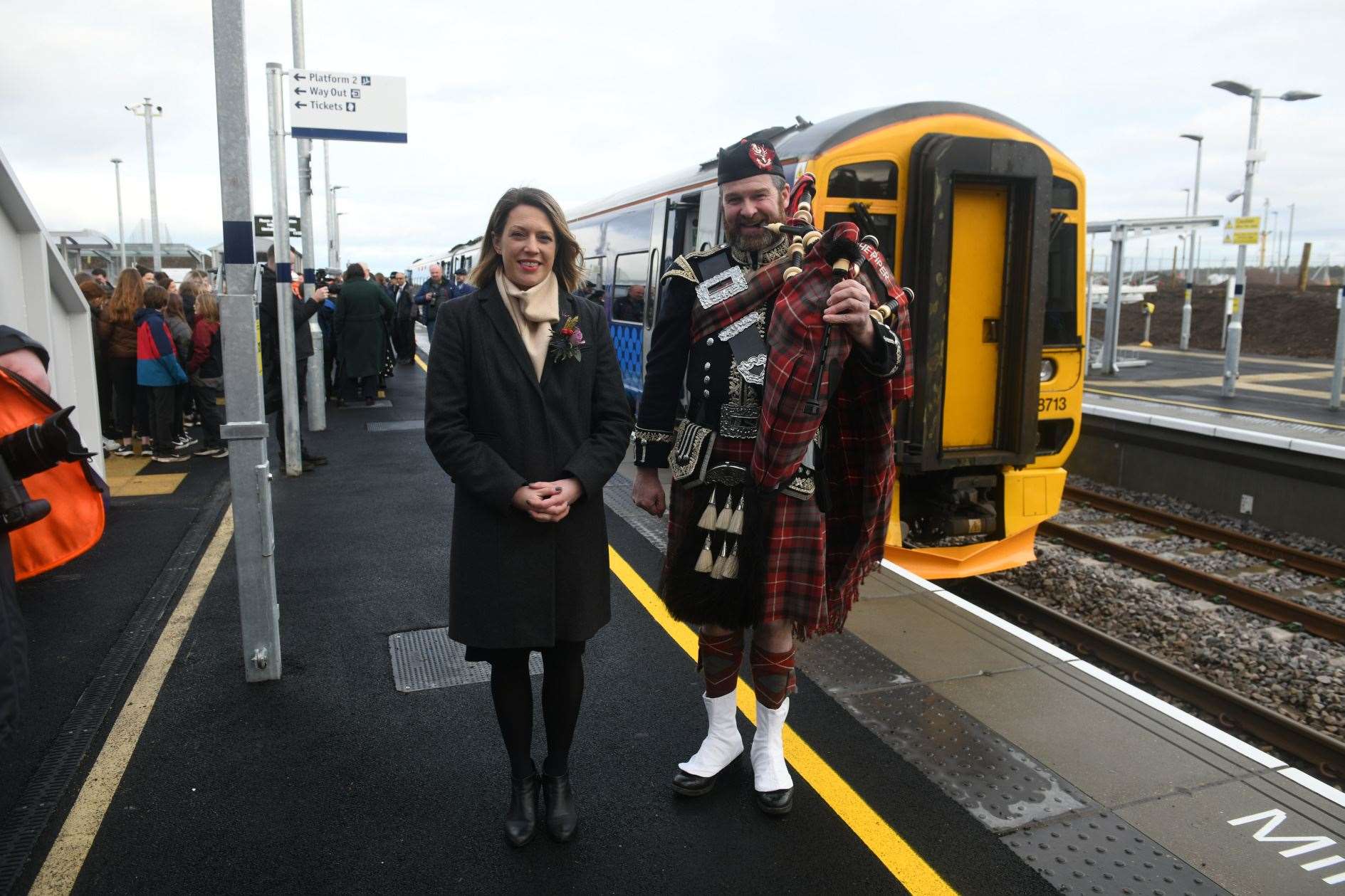 Jenny Gilruth, then Transport Minister, with Aviemore's Spud the Piper, at the opening. Picture: James Mackenzie.