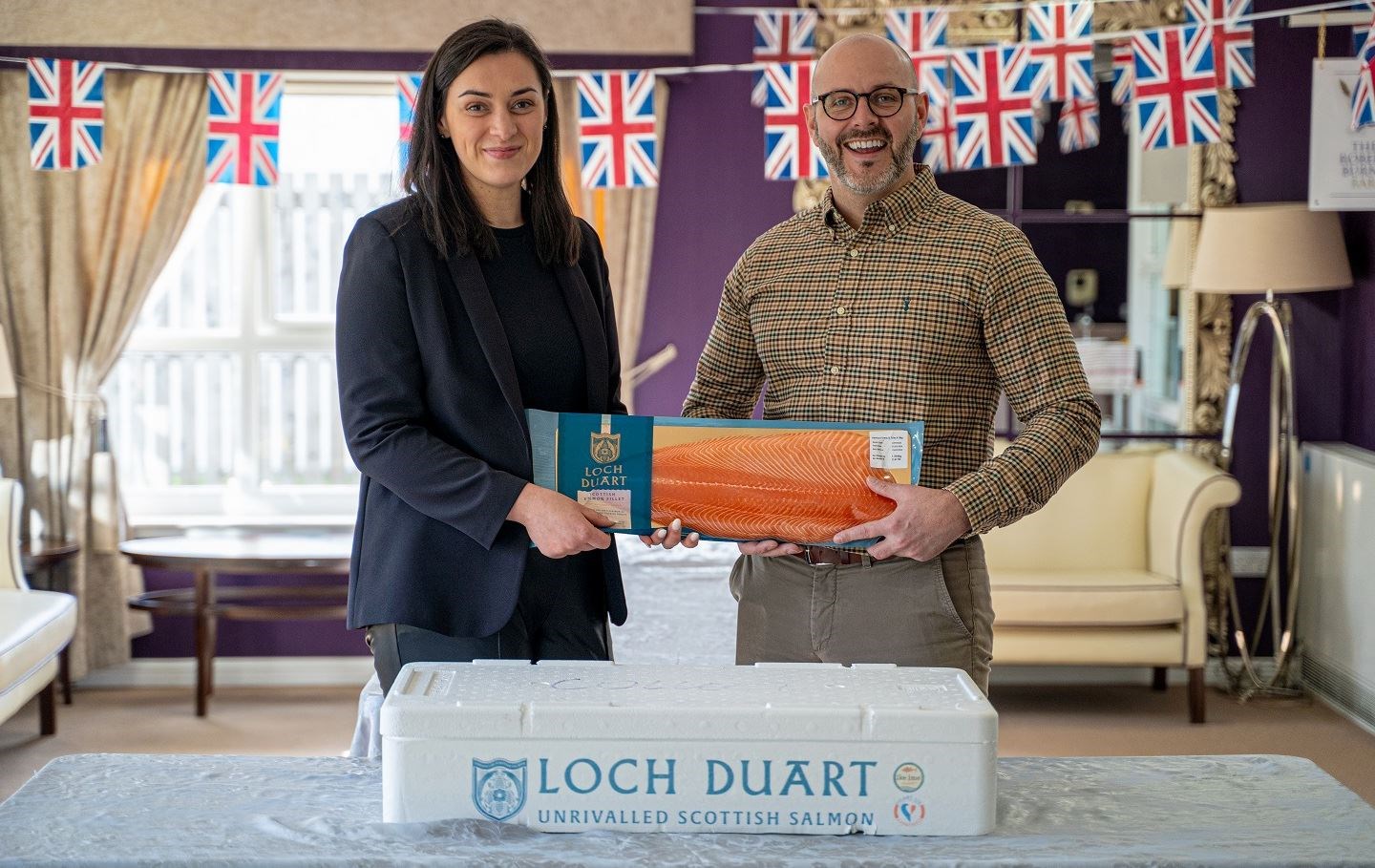 Loch Duart Salmon’s Agnieszka Stoff and care home manager Joe Greiner.